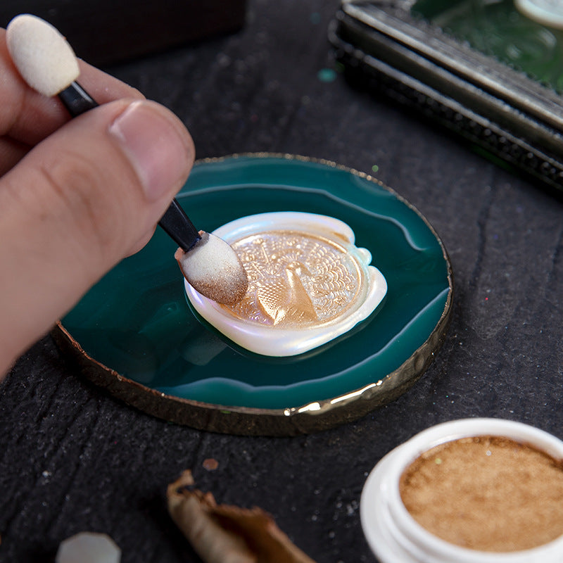 Polvo dorado para pintar sellos de lacre